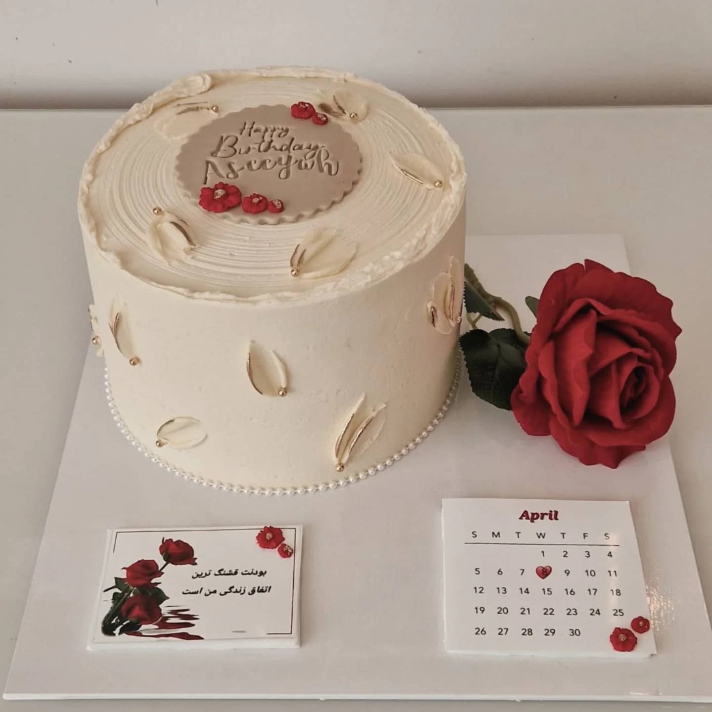 Ivory anniversary cake with roses