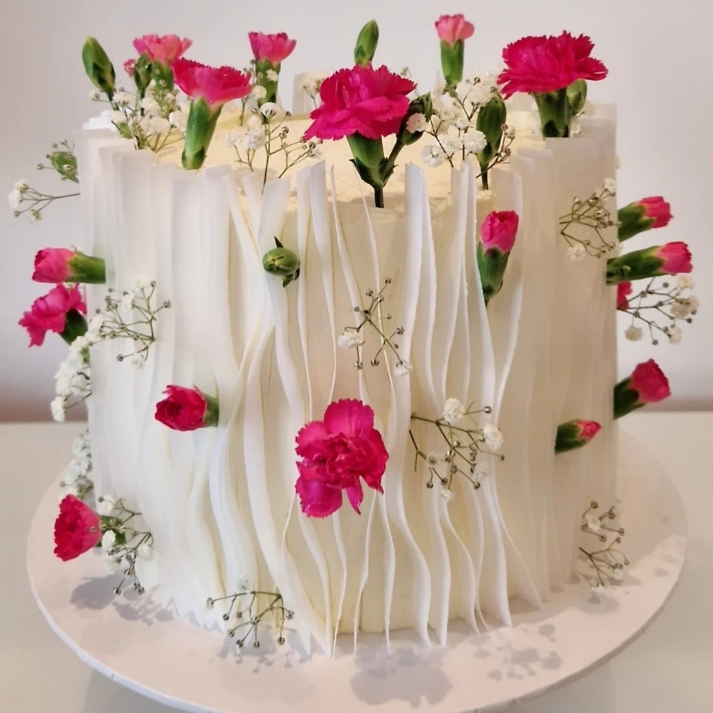 White pleats and carnations